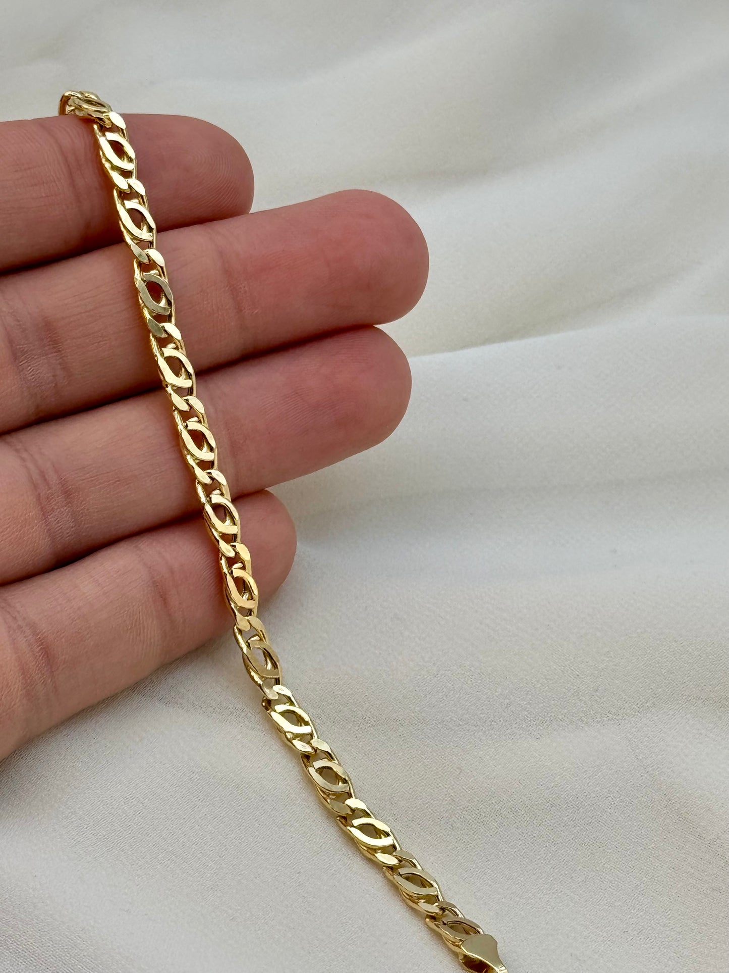 Bird eye bracelet on hand