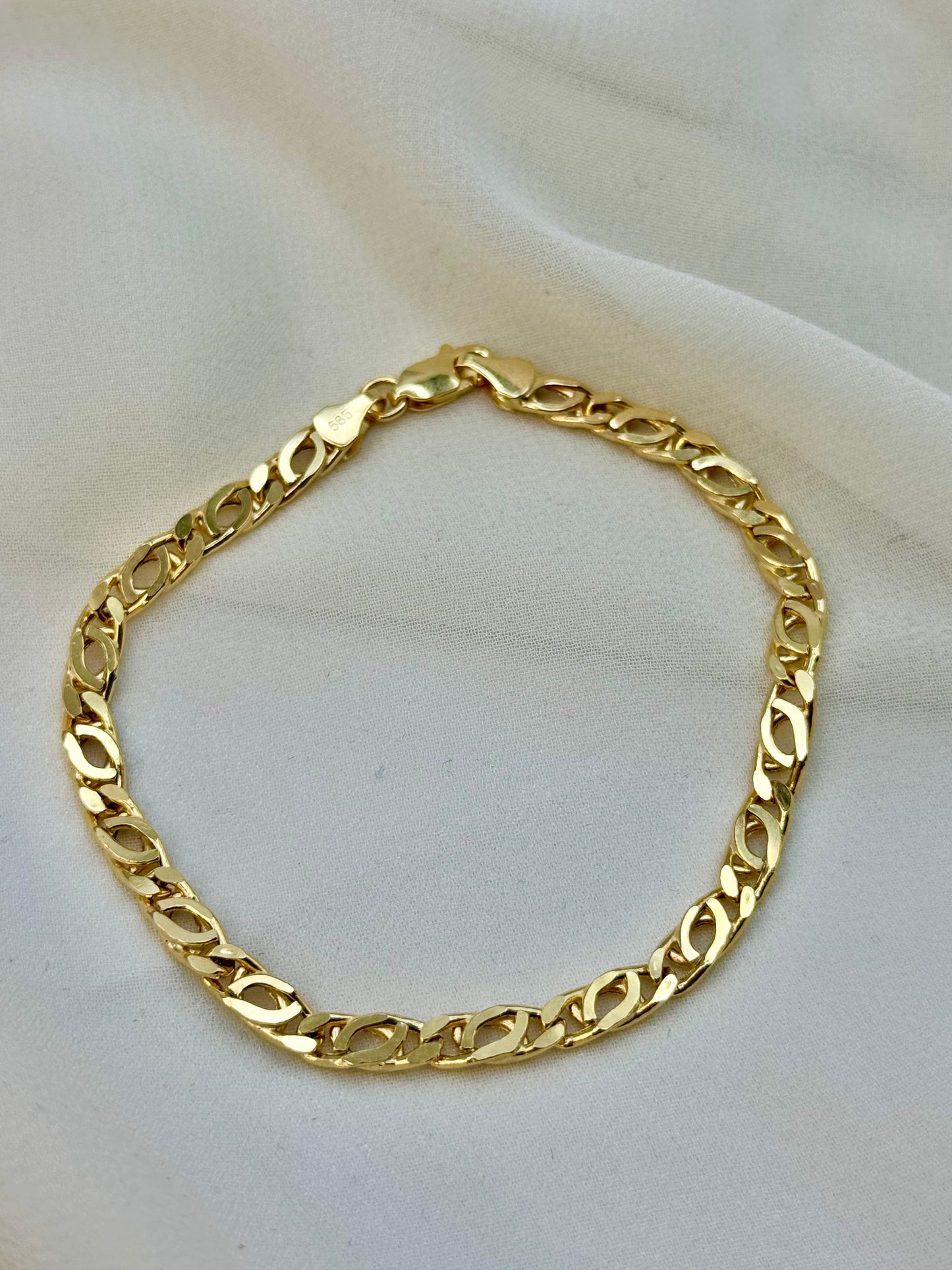 14k bird eye bracelet
