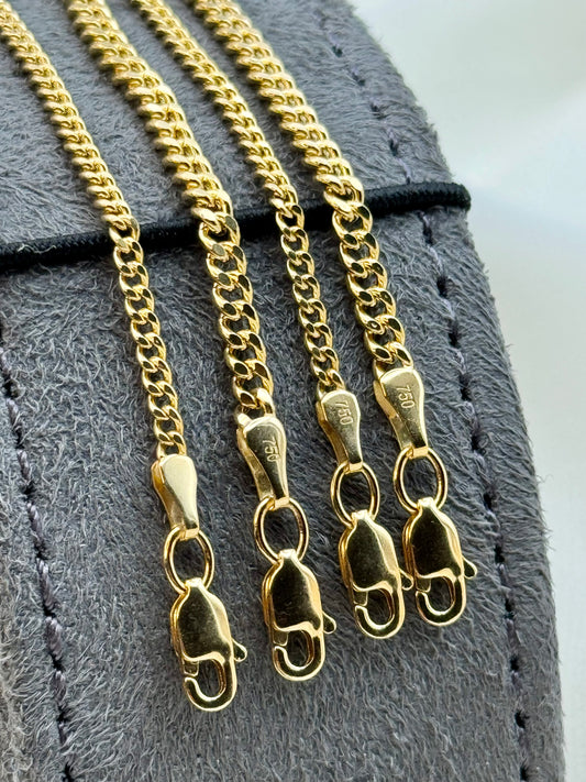 14k Gold Curb chain with lobster clasp.
