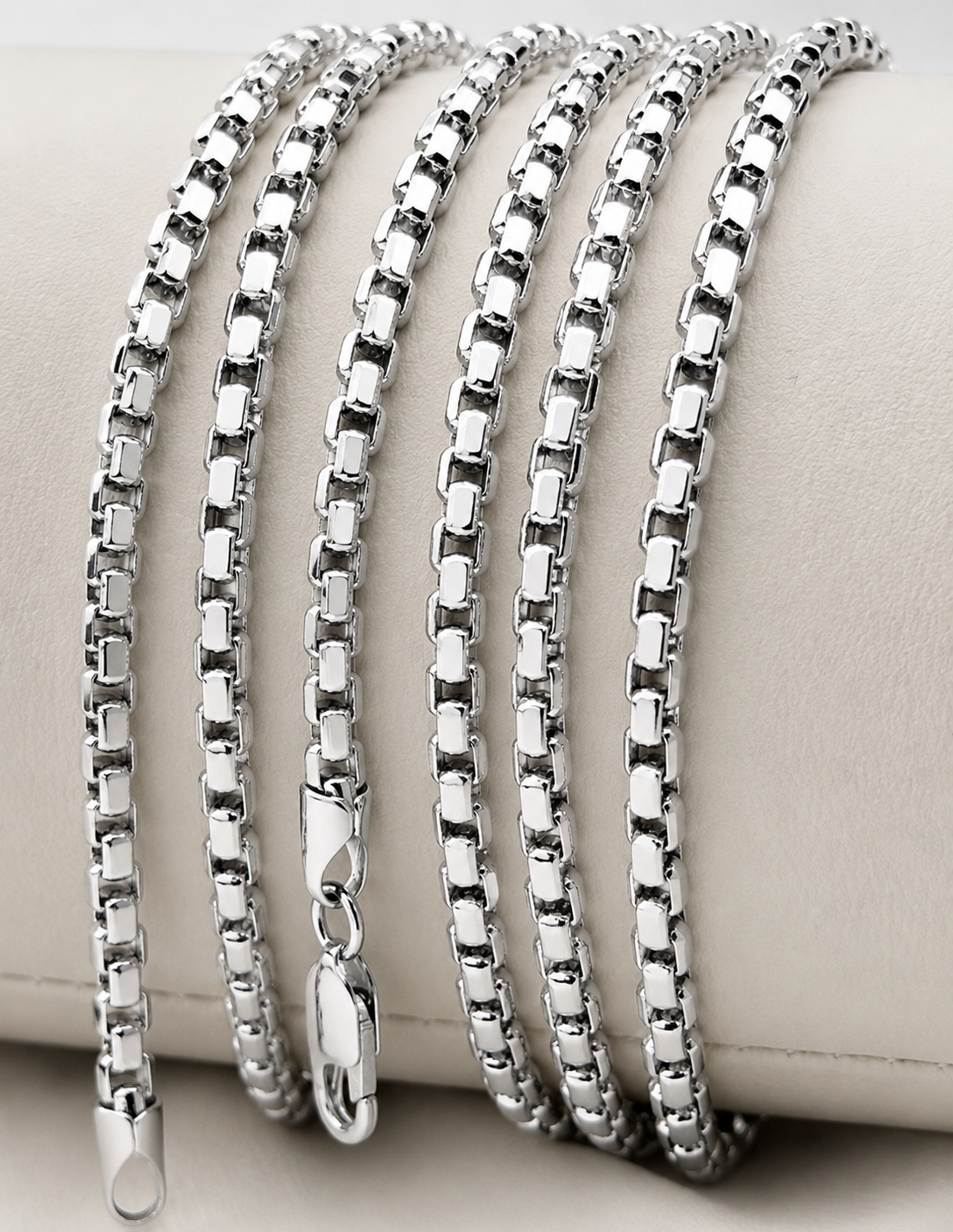 white gold chain in box links on display.